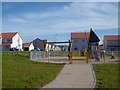 Playground and new houses, Lochend in EH42 1GQ