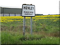 Henley Village Name sign on Main Road in IP6 0RQ