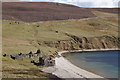 Beach and ruined buildings, Sandsound in ZE2 9LU