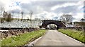 Old railway bridge carrying Tissington Trail over Liffs Road in Eaton and Alsop