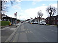 Bus stop and shelter on Woodhouse Road (A1003) in N12 0RX