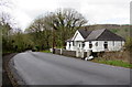White bungalow in Clyne in SA11 4BT