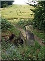 Stone footbridge over Bleakley Dike. in WF2 6QS