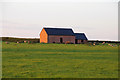 Buildings in a field in Thorpe Langton