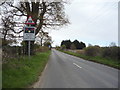 Approaching the level crossing on Plumstead Road in NR13 5BU