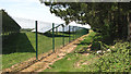 Path skirting the security fence of the solar farm in NR22 6AZ