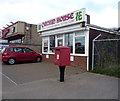 Elizabeth II postbox and takeaway on Rottenstone Lane in NR29 3QT