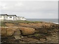 Coast and caravans at Newbiggin Point in NE64 6PD