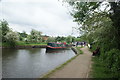 View of a narrowboat passing out of Stocker's Lock in WD3 1PD
