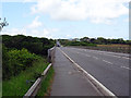 Beside the A477 road on the Wales Coastal path in SA73 1PL