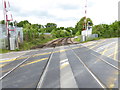 Looking along railway from crossing on Nye Road in RH15 8PX