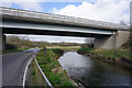 Road and river under the A484 in Llwchwr Community