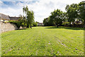 Open grassed area near St Mary's Church in PE7 1DE