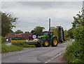 John Deere tractor with Claas mowing equipment in SO50 7PT