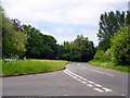Junction of Ford Road with Windlesham Road in GU24 8LB