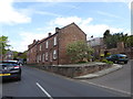 Terraced houses on Village Road in CH48 0RT