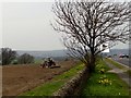 Farmer harrowing a field near Rowley in DH8 9QJ