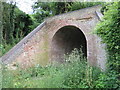 Disused railway bridge over footpath in CO7 6QH