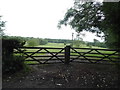 Field entrance on Olantigh Road in TN25 5DH
