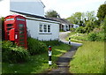 Telephone box and post box at Treworga in TR2 5NW