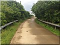 Track to a bridge over the A23 in BN6 9DB