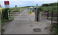 West side of a level crossing near Penally railway station in SA70 7NT