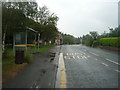 Bus stop and shelter on Knutsford Road (B5085), Row-of-Trees in SK9 7SF