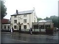 Coach and Four public house, Wilmslow in SK9 1LY