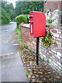 Elizabeth II postbox outside the Bird in Hand public house in WA16 7BQ