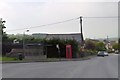 Bus stop and phone box, New Road, Bickleigh in PL6 7AL