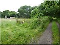 Footpath goes west to Burgess Hill with shed in field to left in RH15 0BG