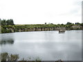 Water filled quarry in AB39 3AB