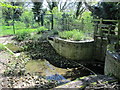 Water infrastructure at the eastern end of the New River (old course) in EN2 9HJ