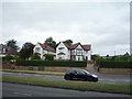 Large houses on the A52 in NG9 3HP