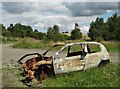Burnt out car wreck near Bolton Ings in S63 8EN