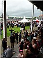 Racegoers in the Bustardthorpe Stand in YO24 1JT