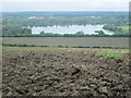 Holyfield Lake beyond a ploughed field in EN9 2EA