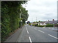 Bus stop and shelter on Whalley Road (A666) in BB6 8HQ