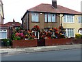 Floral display outside a private house in L23 0TX