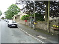 Elizabeth II postbox and phonebox on Higham Hall Road in BB12 9BY