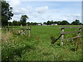 Public footpath and stile near Cross Roads Farm in GL7 5TR