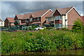 Modern canalside housing on the edge of Nuneaton in CV10 9QA