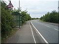 Bus stop and shelter on Back Lane in DE74 2TW