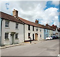 Colour-washed cottages, High Street, Ilchester in BA22 8LR