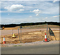 Security fence beside Fir Covert Road in NR8 6HR