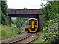 An Aberystwyth bound train passes the site of Meole Brace station in SY3 9AG