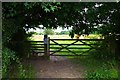 Stile and gate on public footpath to Widford, Oxon in OX18 4DU