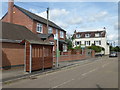 Bus stop and shelter on Main Street, Gunthorpe in NG14 7EX