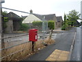 Elizabeth II postbox on Main Road, Holmesfield in S18 7WT