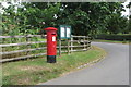 Georgian pillar box and parish notices in MK18 4DA